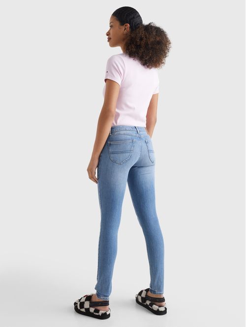 JEANS SOPHIE CEÑIDOS DE TALLE BAJO CON EFECTO DESTEÑIDO