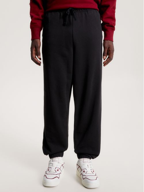 PANTALONES CON INSIGNIA SÓLIDA