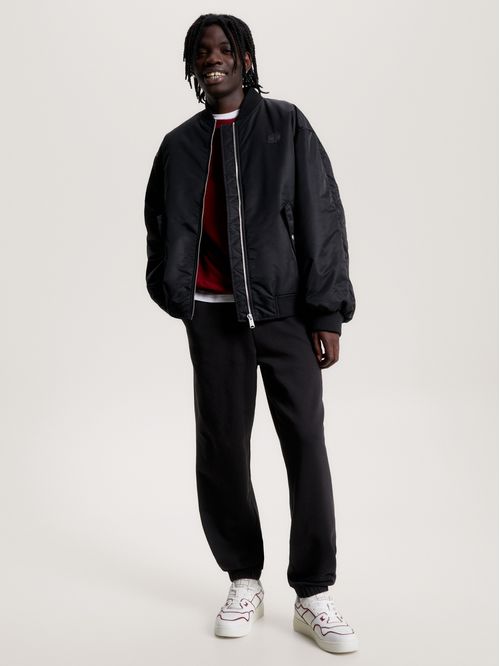 PANTALONES CON INSIGNIA SÓLIDA