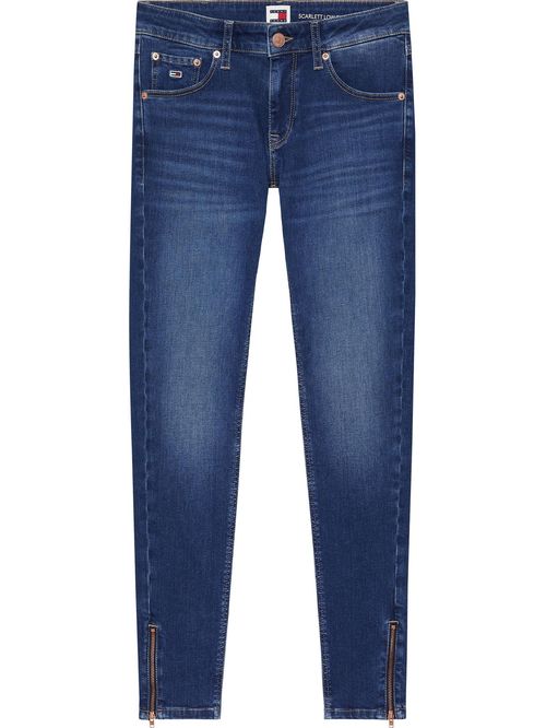 Jeans denim skinny con zipper en los tobillos.