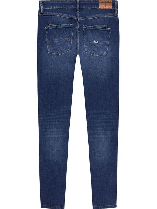 Jeans denim skinny con zipper en los tobillos.