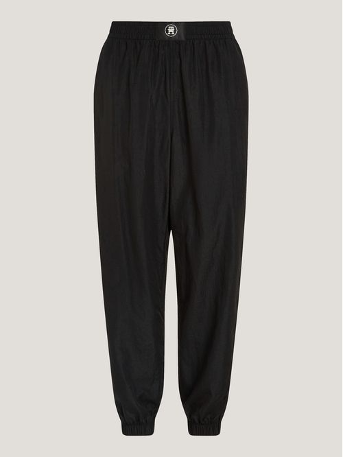 Joggers deportivos amplios con monograma TH