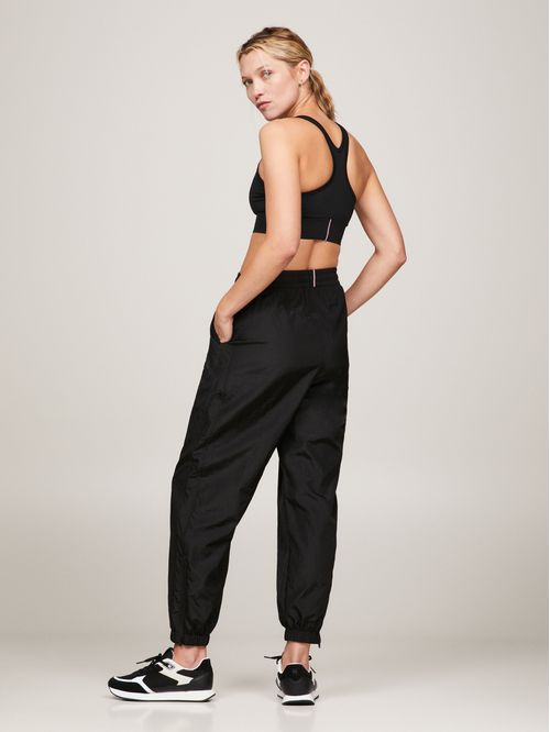 Joggers deportivos amplios con monograma TH