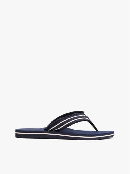 Chancletas con tiras de textil trenzado