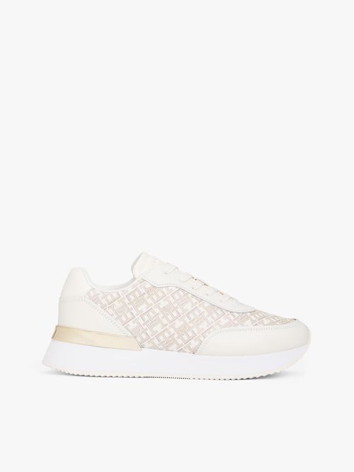 Zapato tenis de cuero con monograma TH